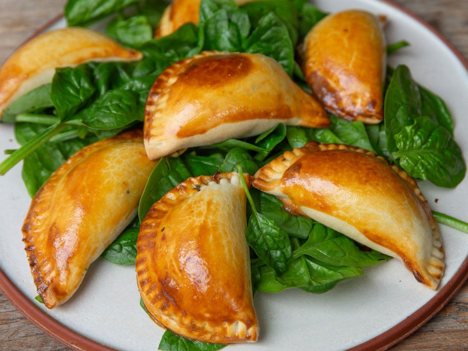 Empanada's met spinazie, champignons en blauwe kaas