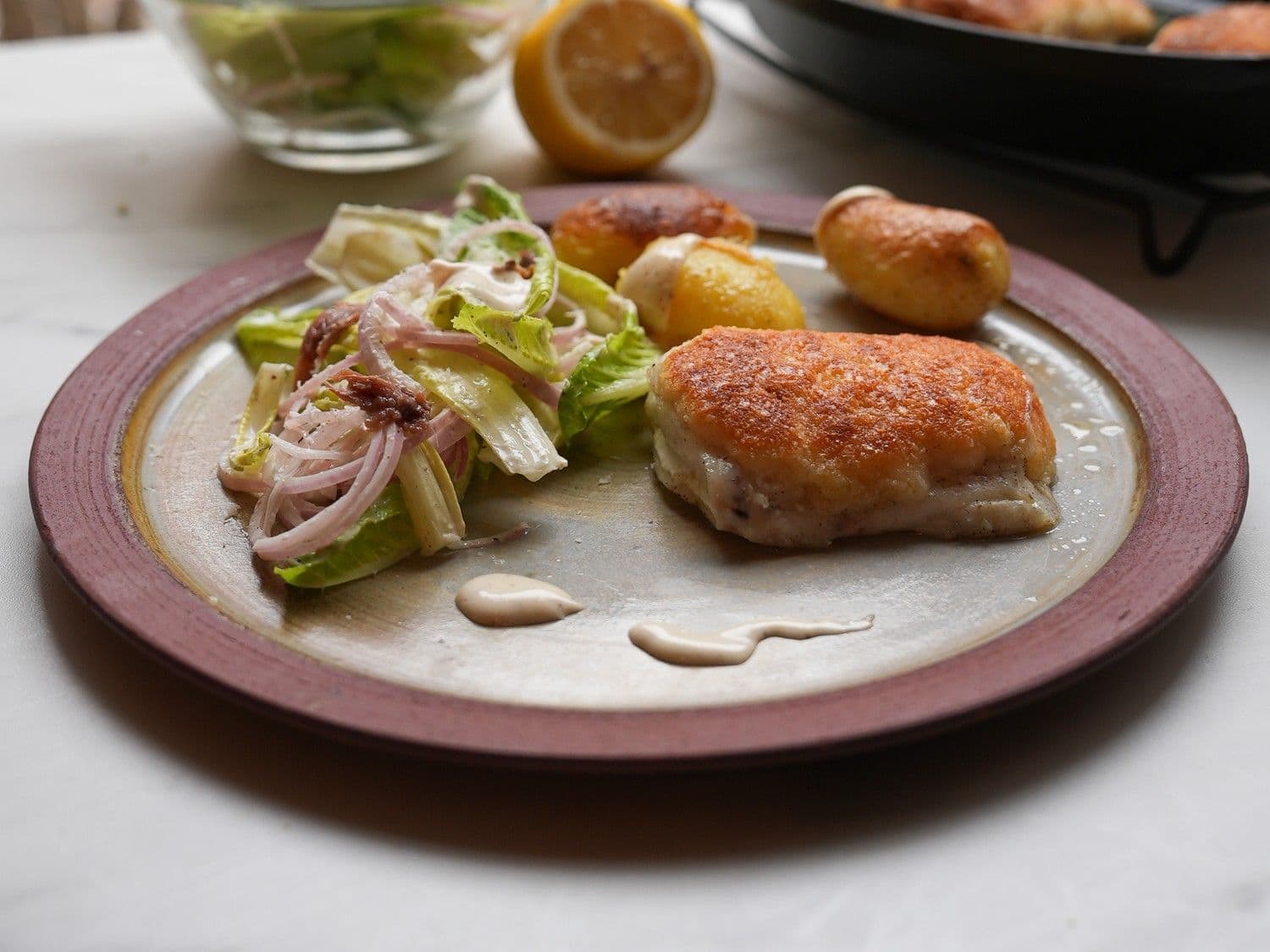 Griet met parmezaankorst, caesarsalade en gebakken krieltjes