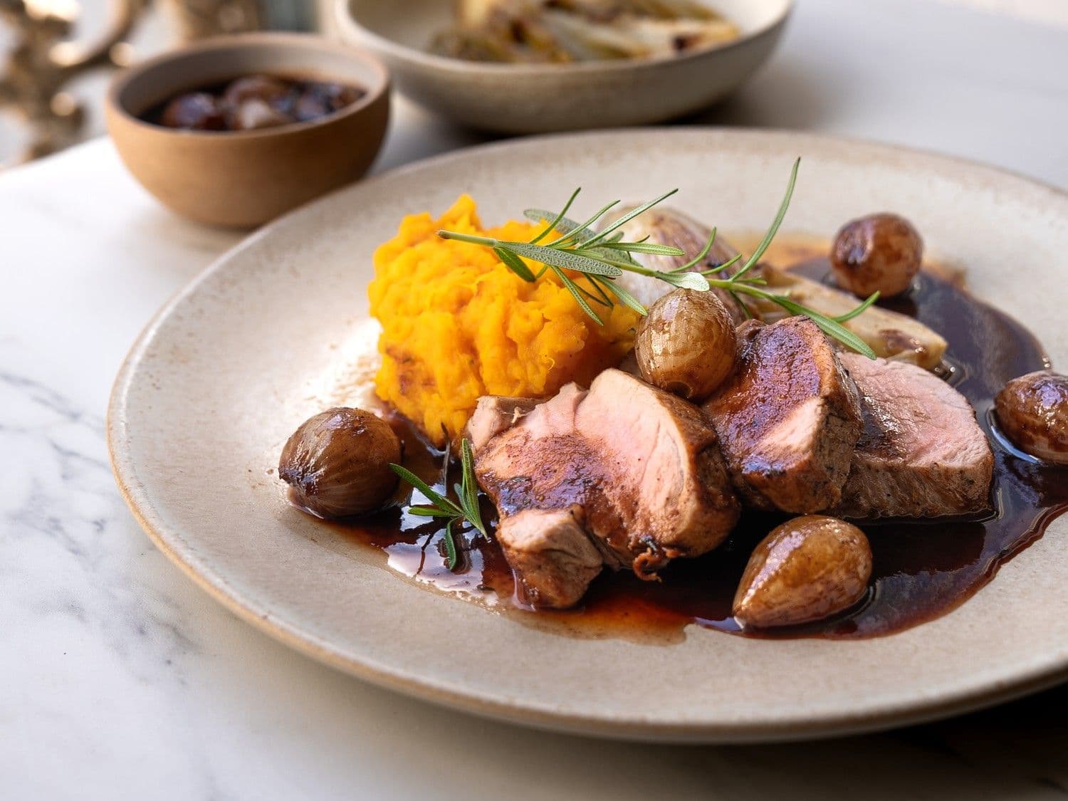 Varkenshaas met portosaus, pompoenpuree en witloof