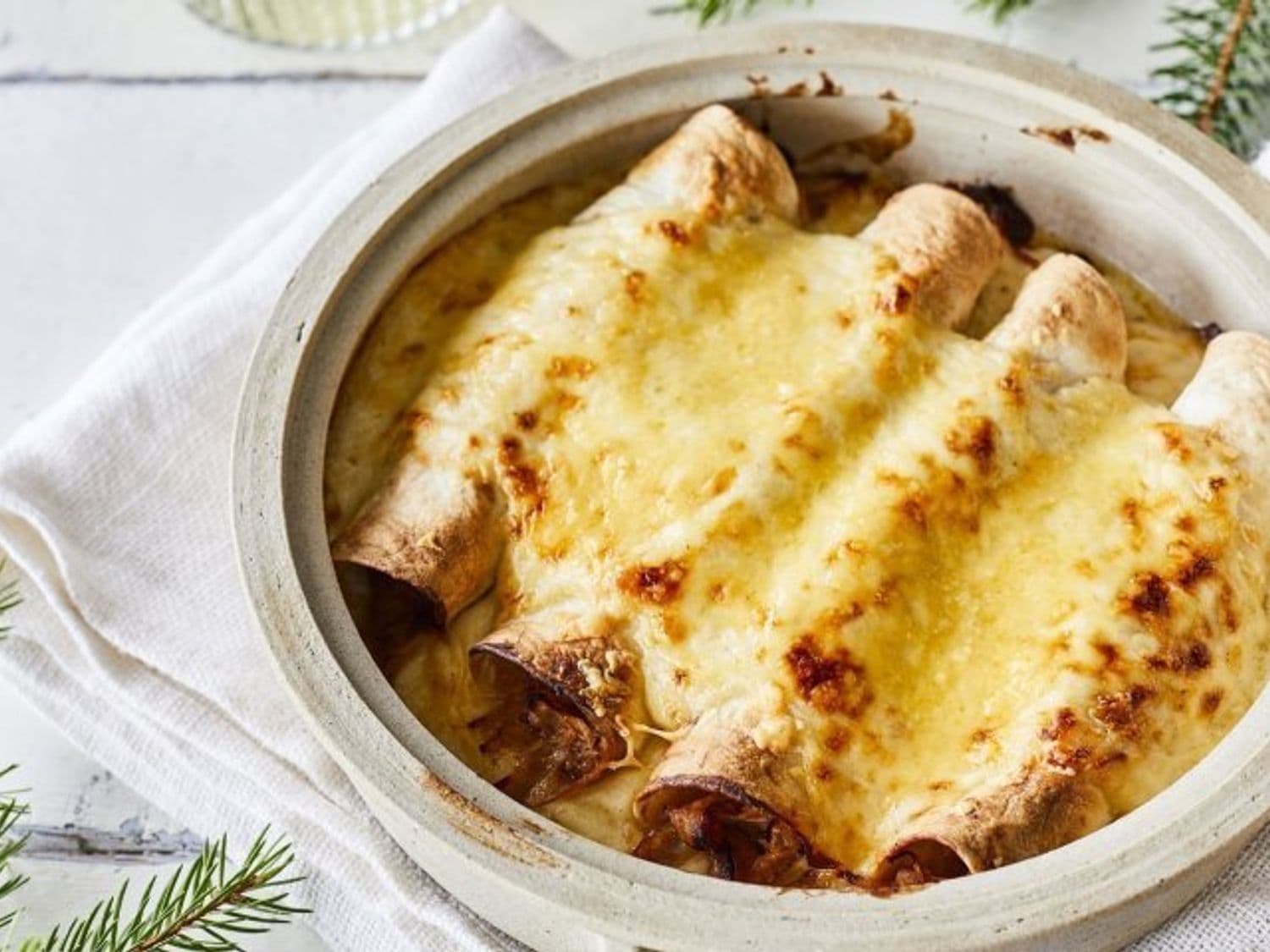 Taquitos met pulled rabbit en kaassaus