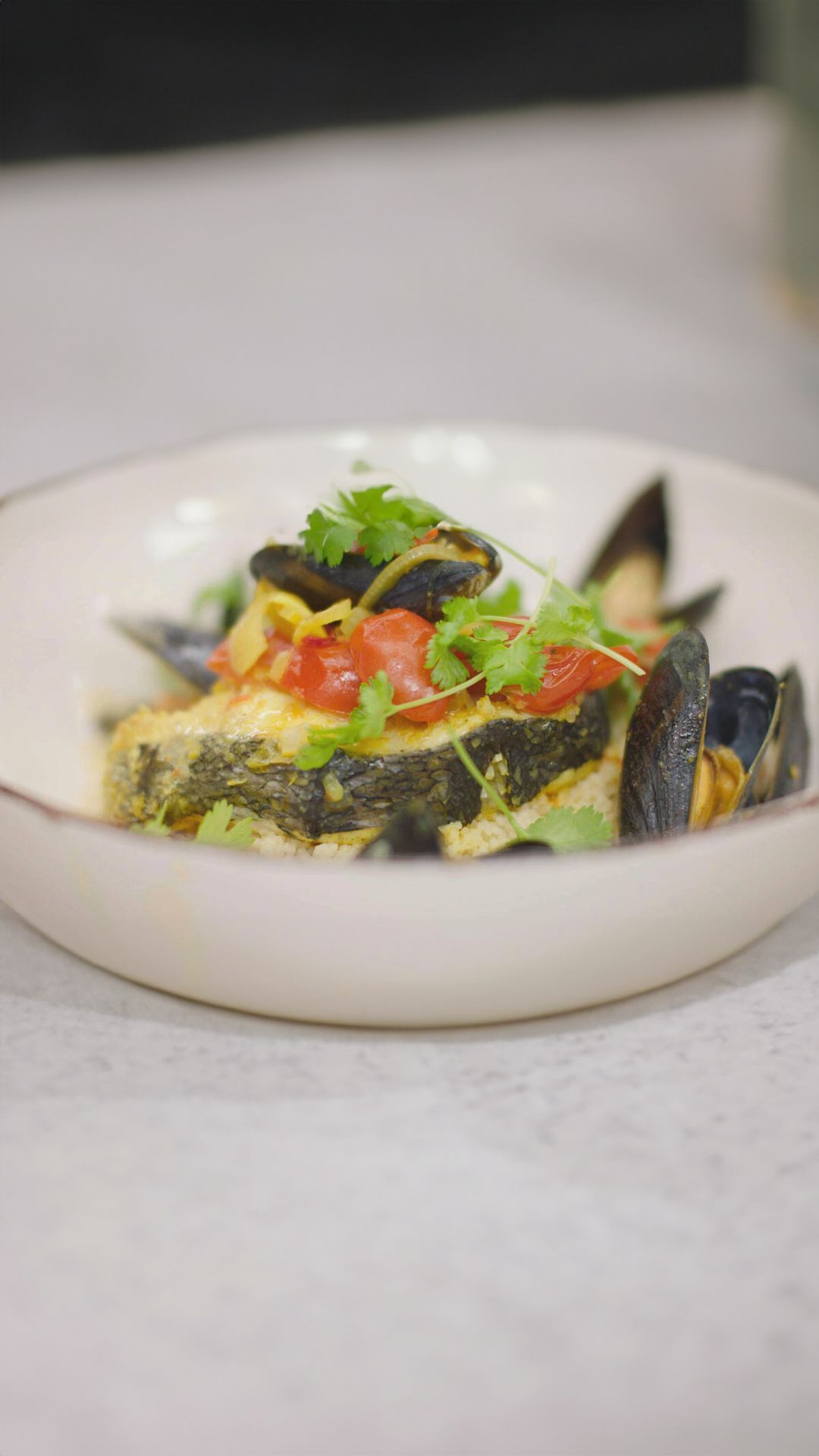 Tajine van schelvis met mosselen