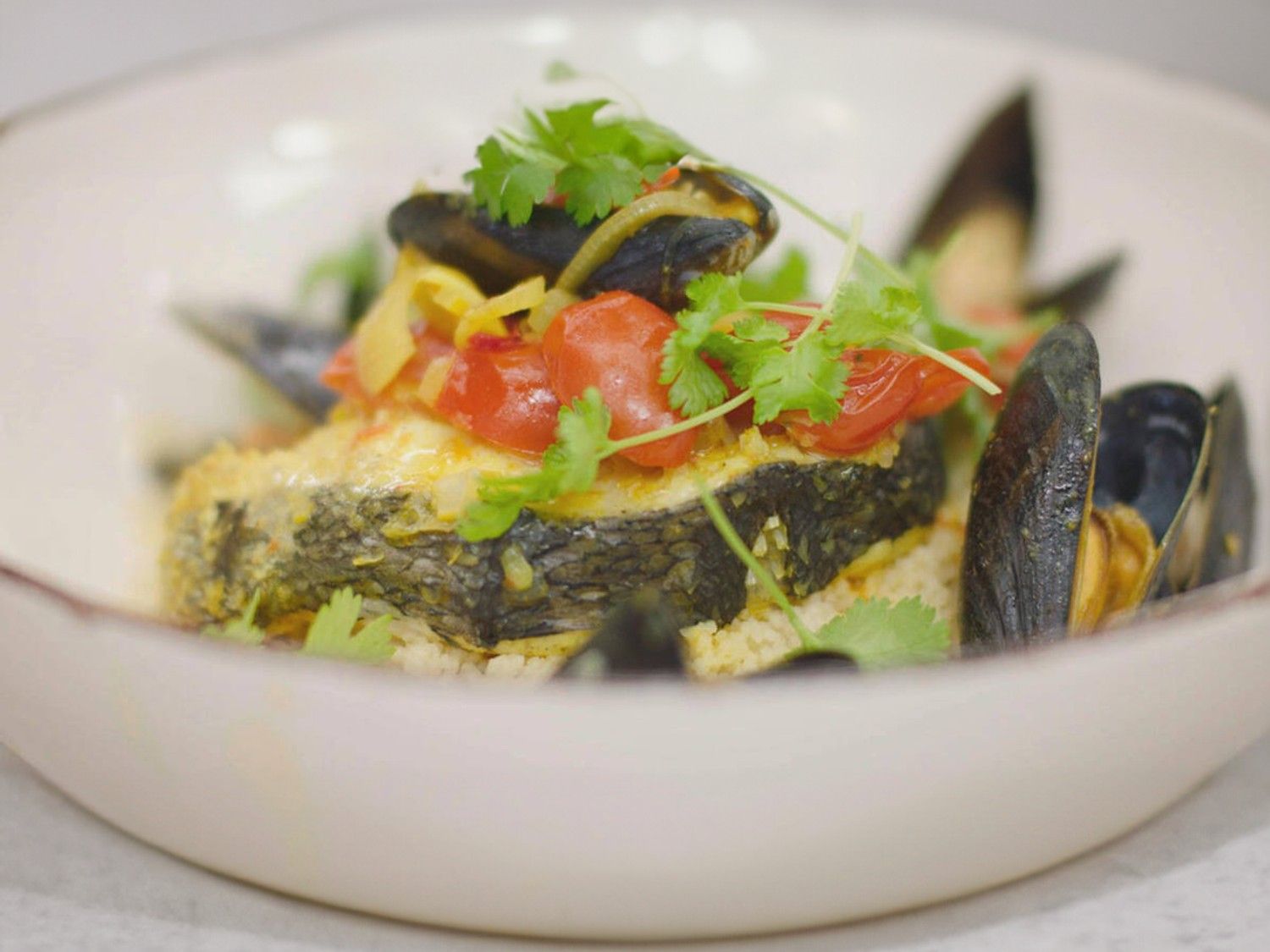 Tajine van schelvis met mosselen