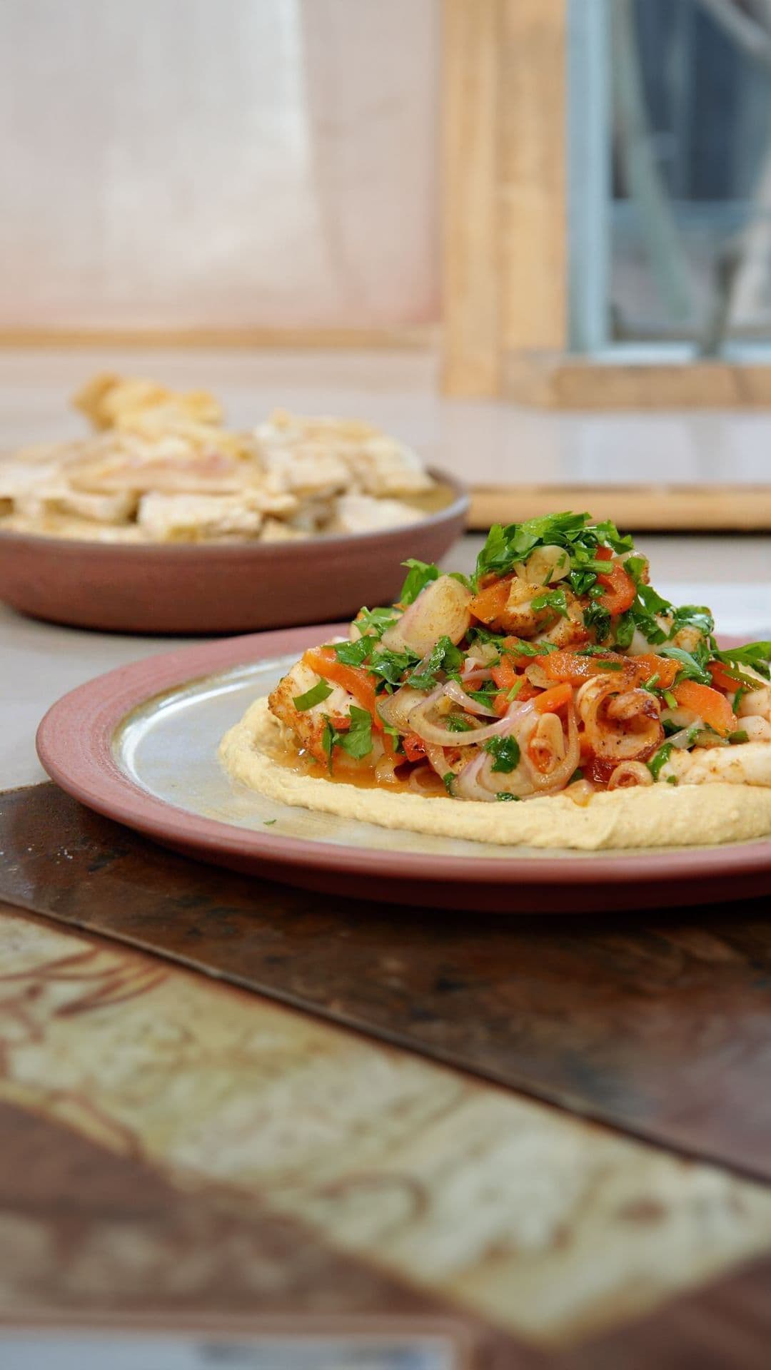 Pijlinktvis met kikkererwten en paprika