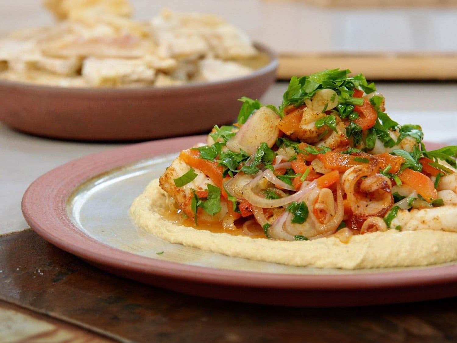 Pijlinktvis met kikkererwten en paprika