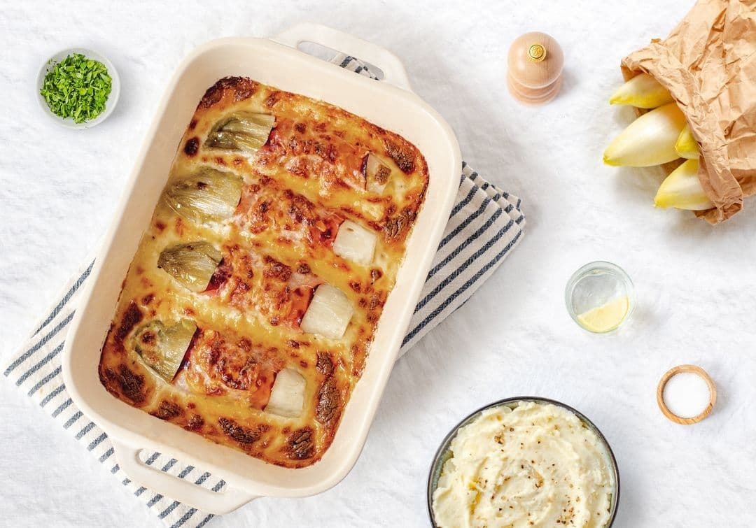 Witloofrolletjes met kaassaus