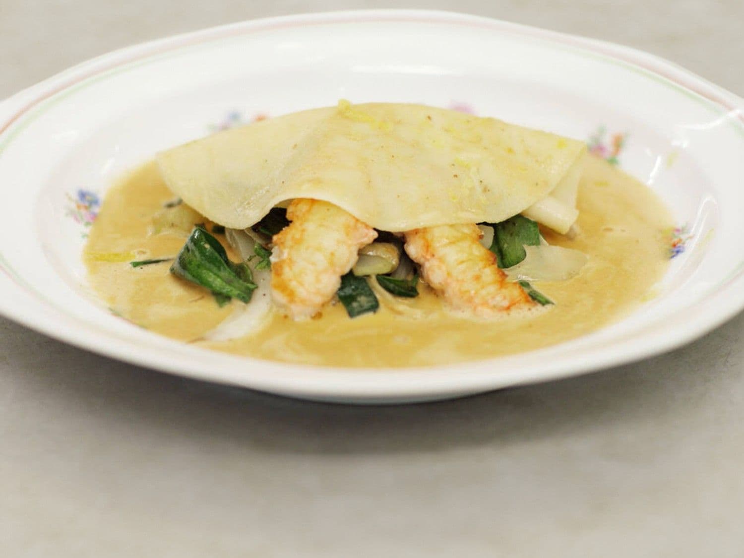 Open ravioli met verse langoustines