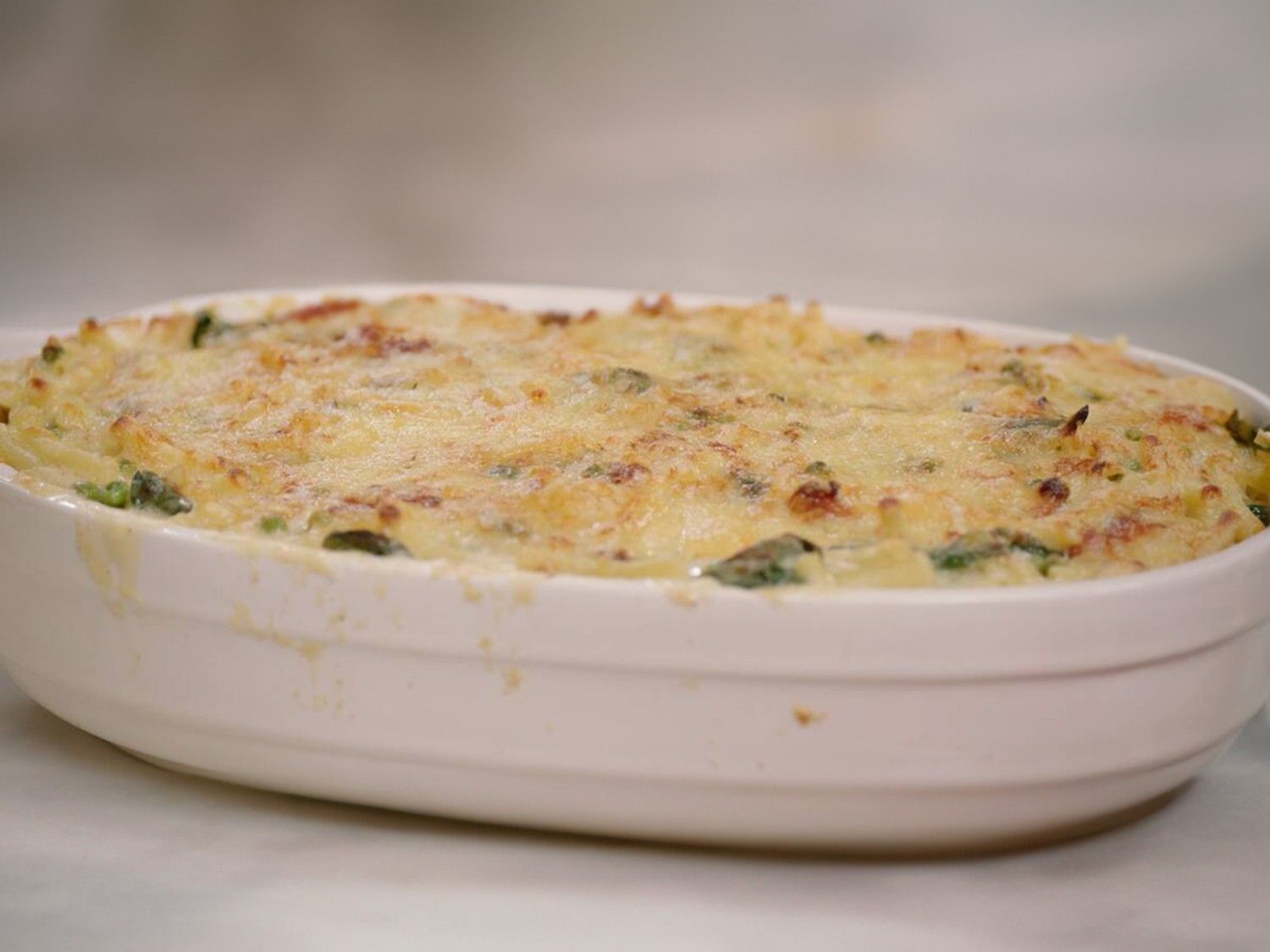 Macaroni met kip, spinazie en erwtjes