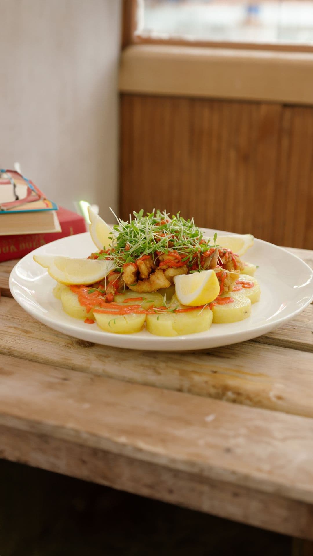 Gegrilde inktvis met patatas bravas en crème van paprika