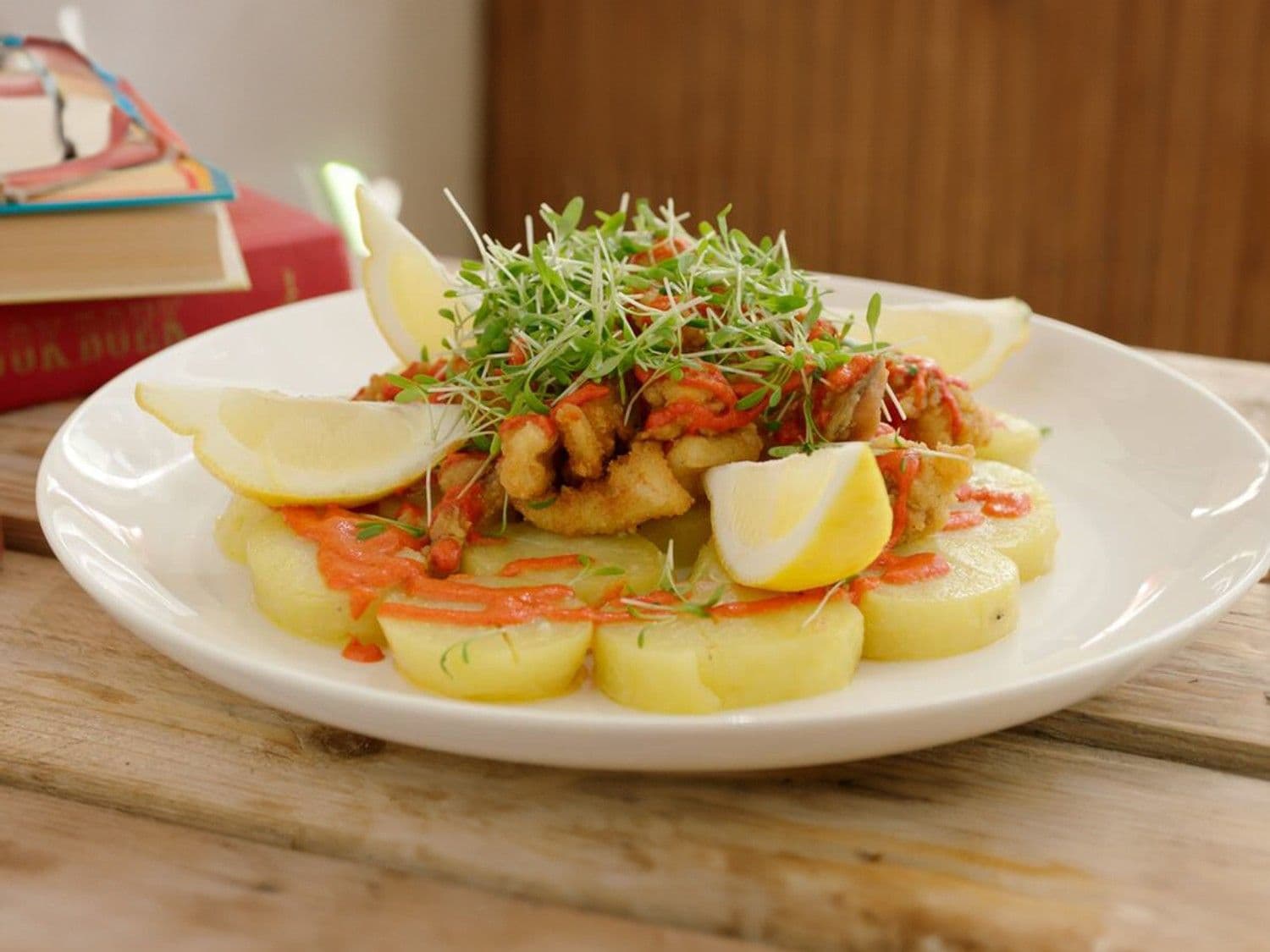 Gegrilde inktvis met patatas bravas en crème van paprika