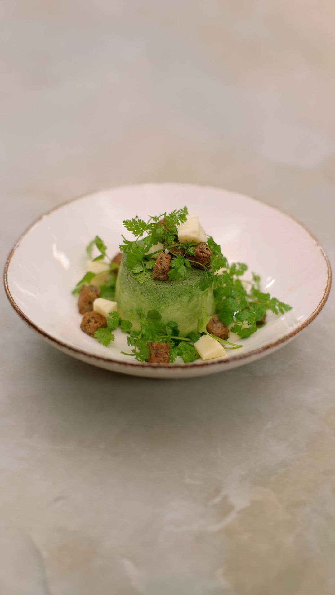 Flan van spinazie met kaas en croutons