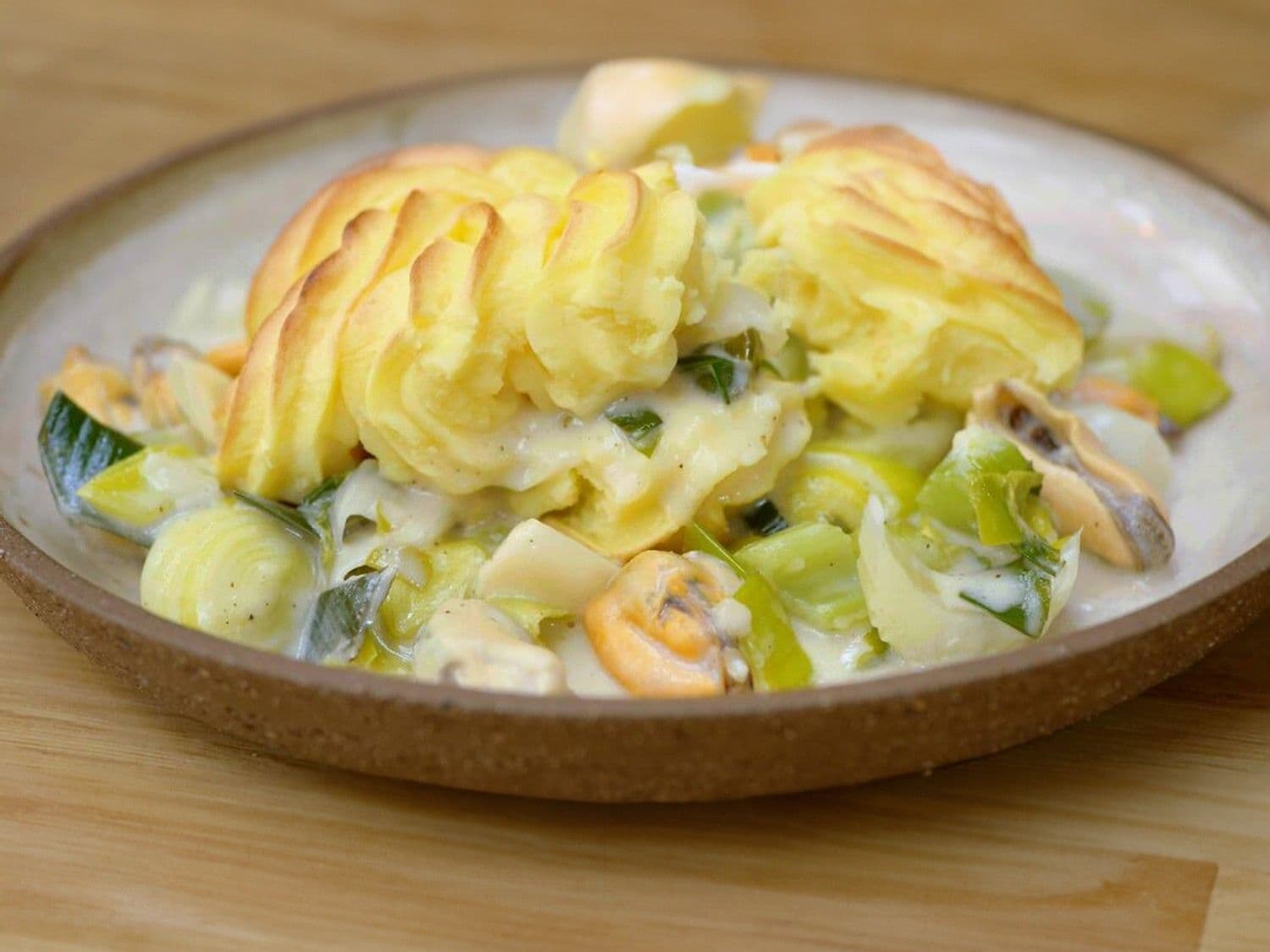 Ovenschotel met kabeljauw, mosselen en pommes duchesse