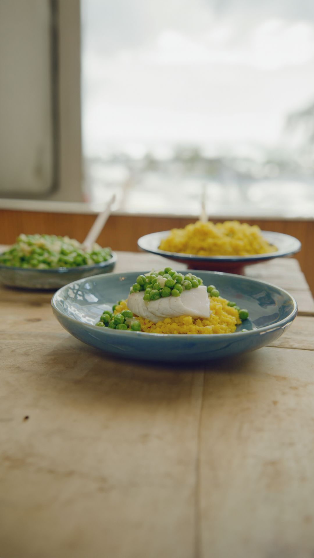 Schelvis met bulgur risotto, erwtjes en saffraan