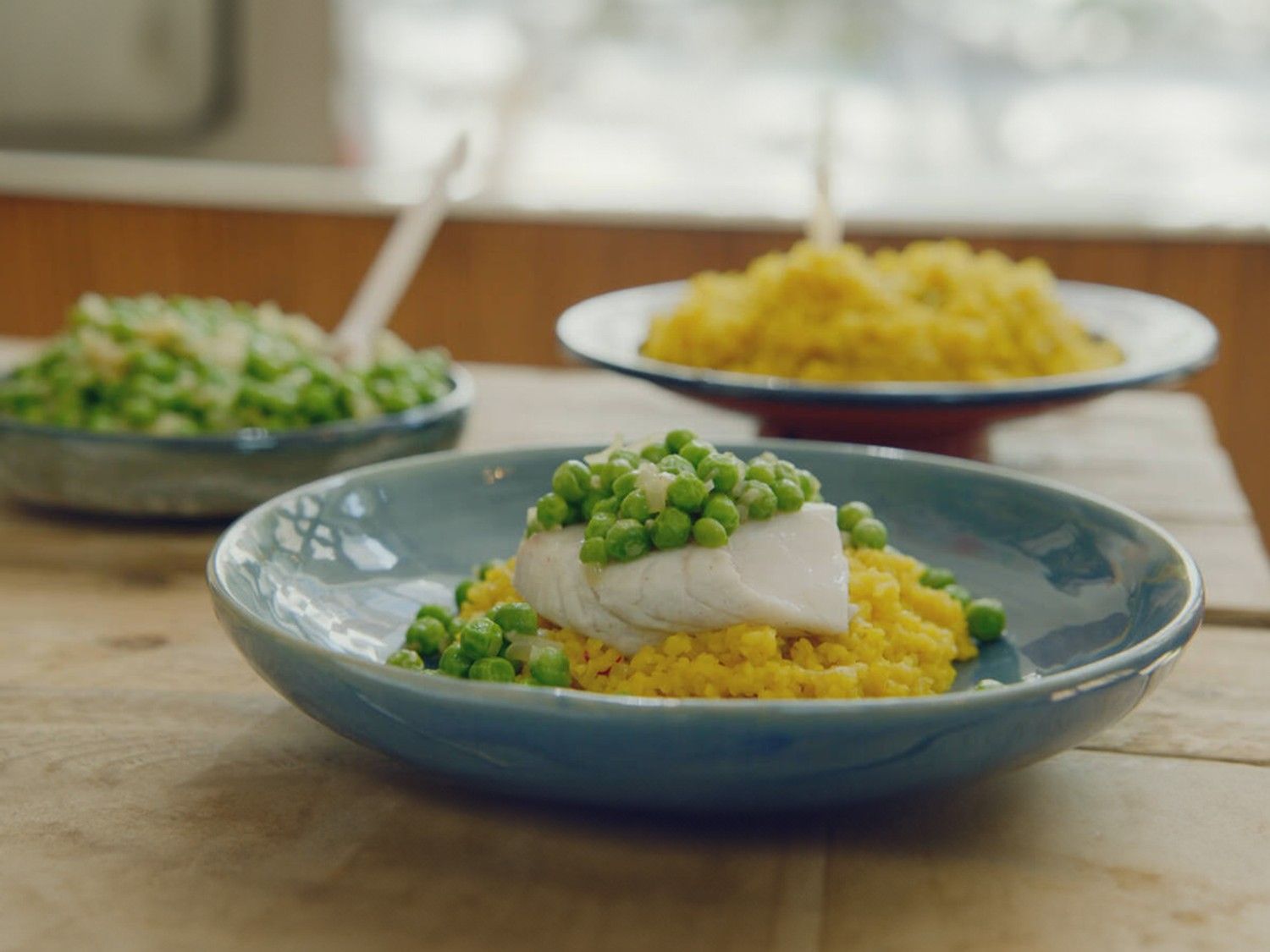 Schelvis met bulgur risotto, erwtjes en saffraan