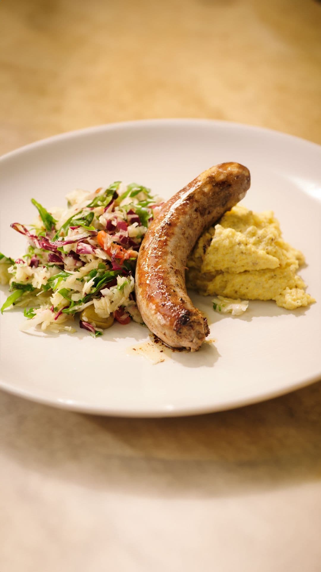 Salade met venkel, salsiccia en polenta