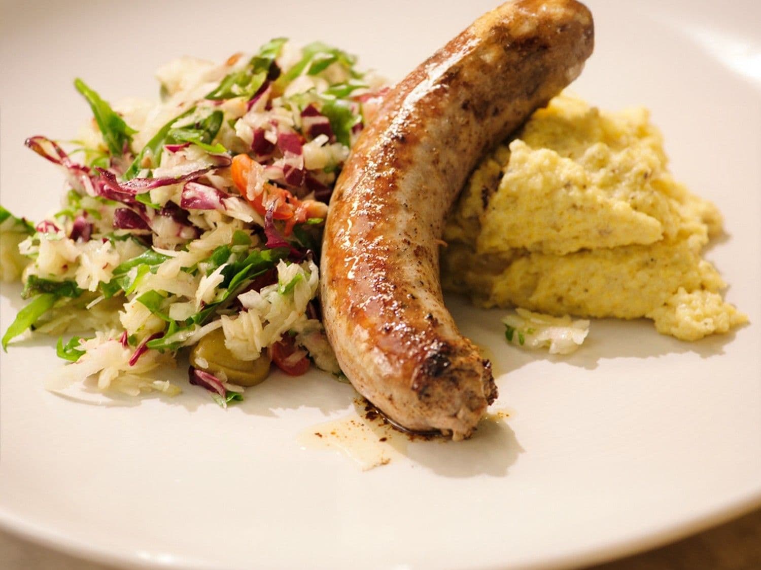 Salade met venkel, salsiccia en polenta