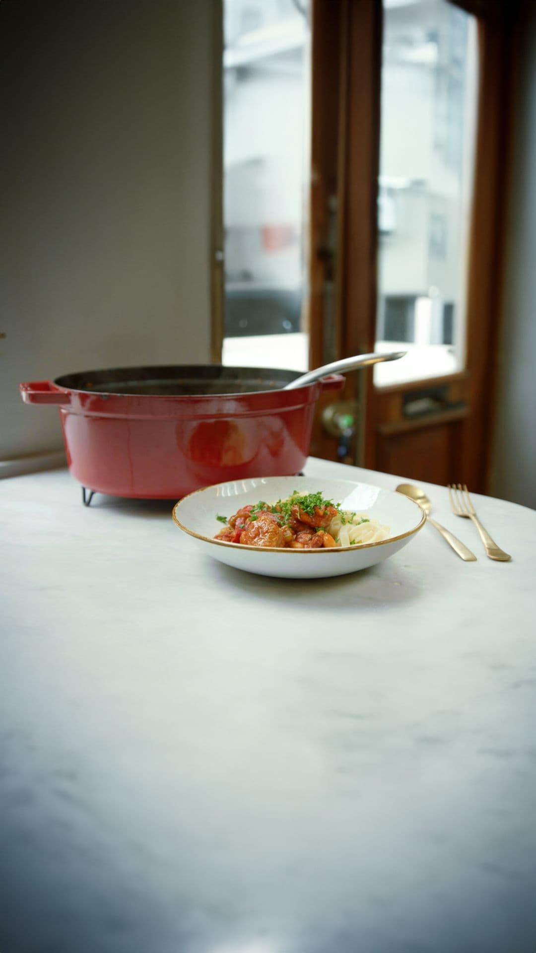 Ossobuco met witte bonen en pasta