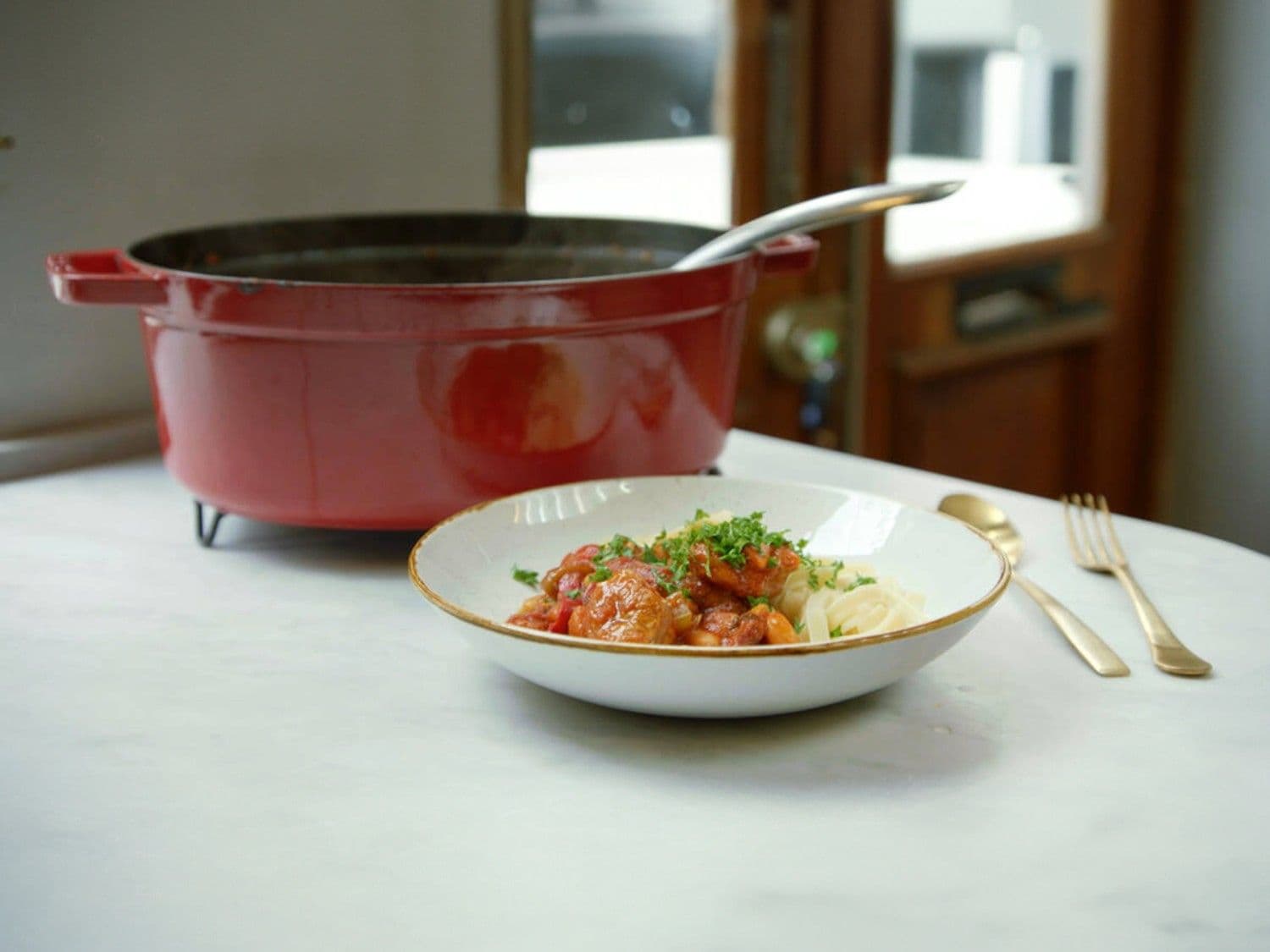 Ossobuco met witte bonen en pasta