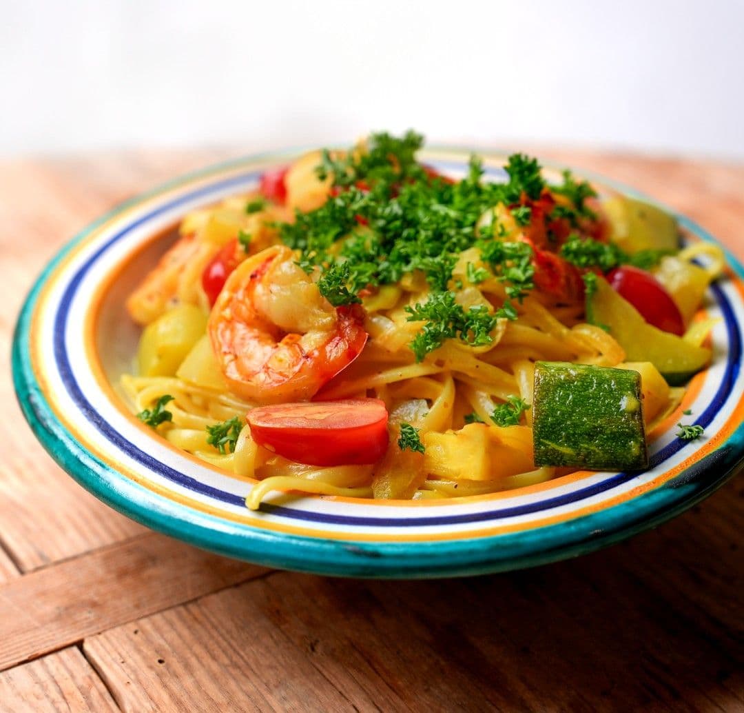 Linguine met scampi, courgette en venkel
