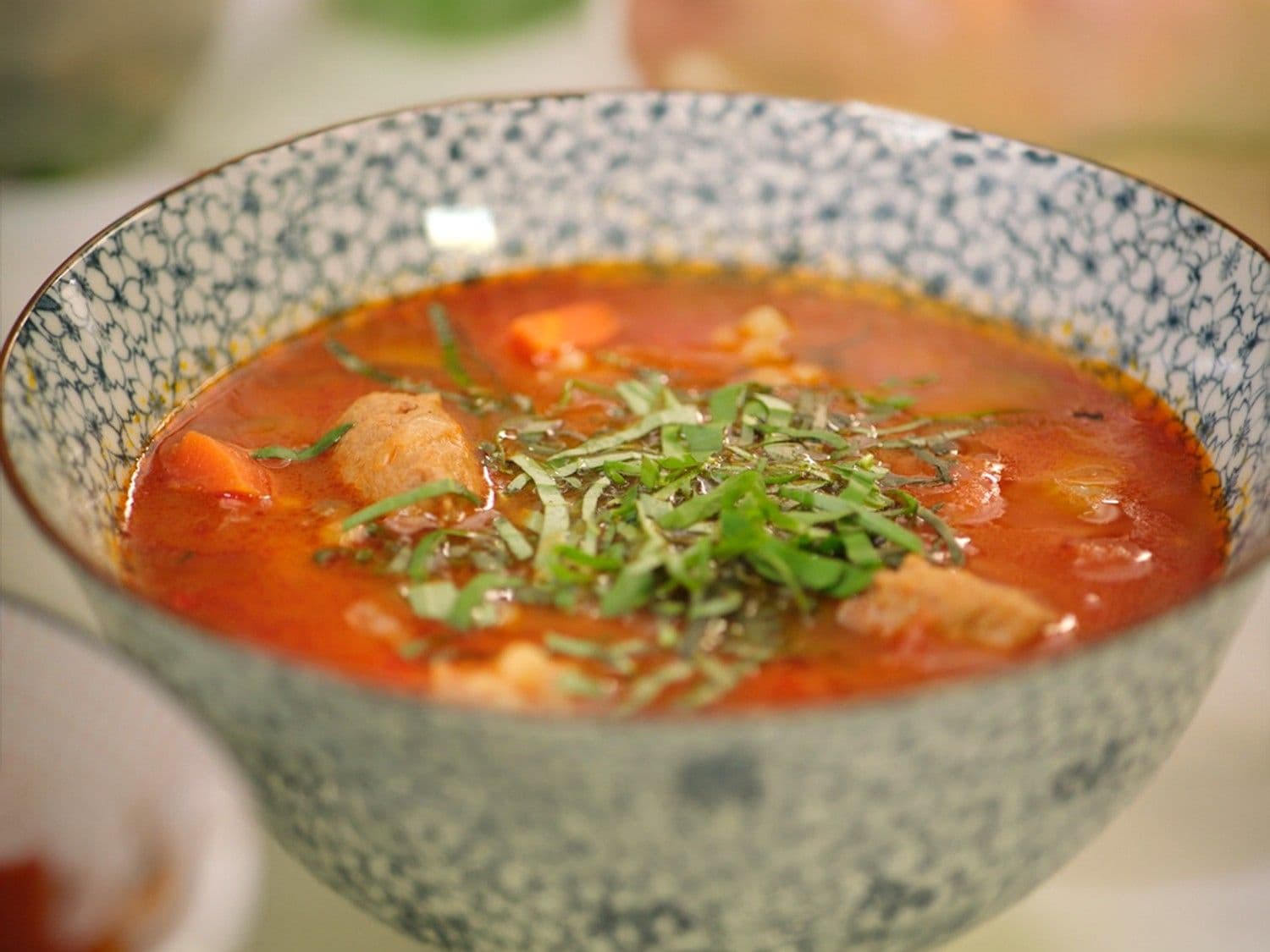 Pittige tomatensoep met fregola en merguez