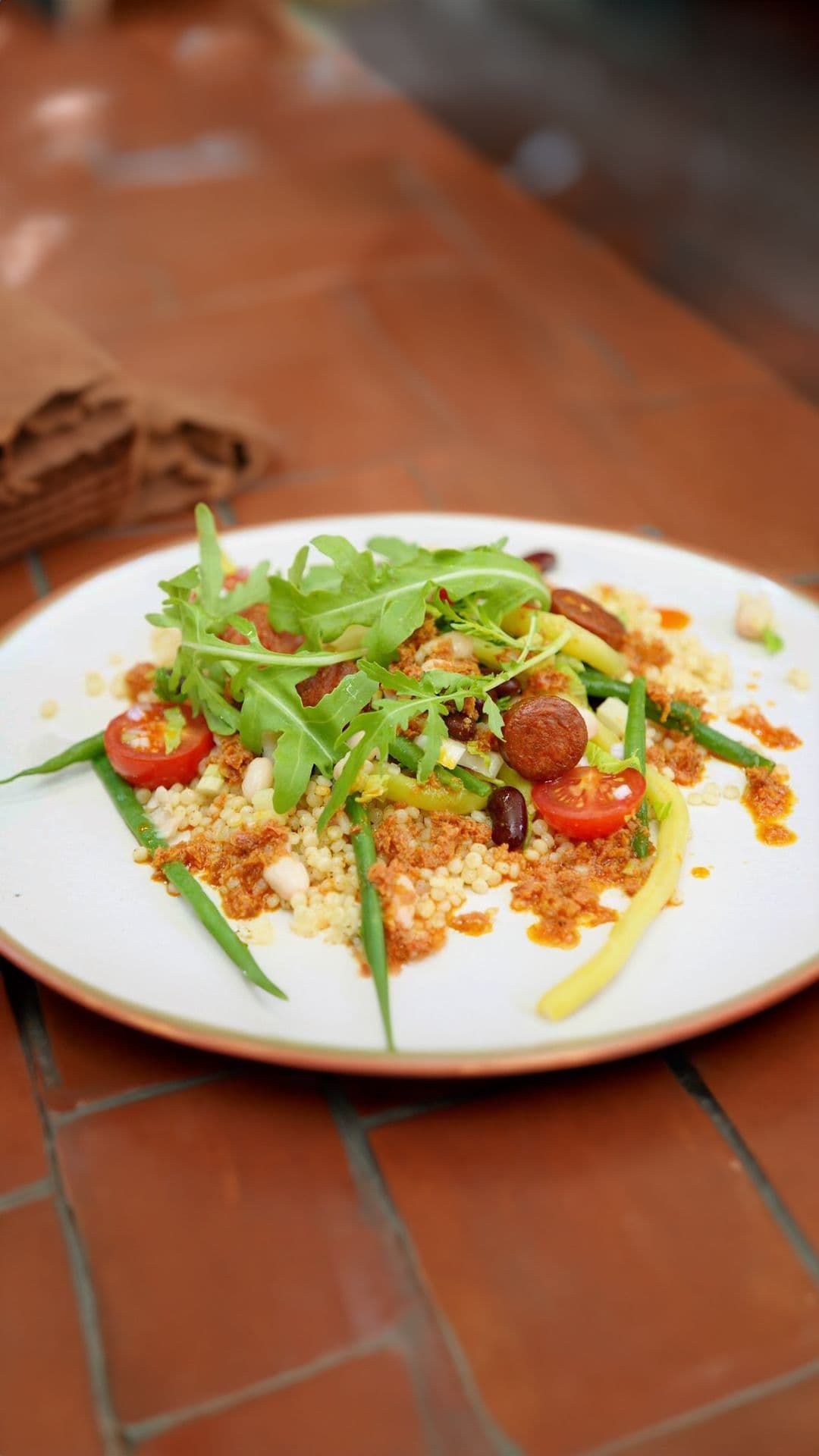 Bonensalade met handgerolde couscous en chorizo