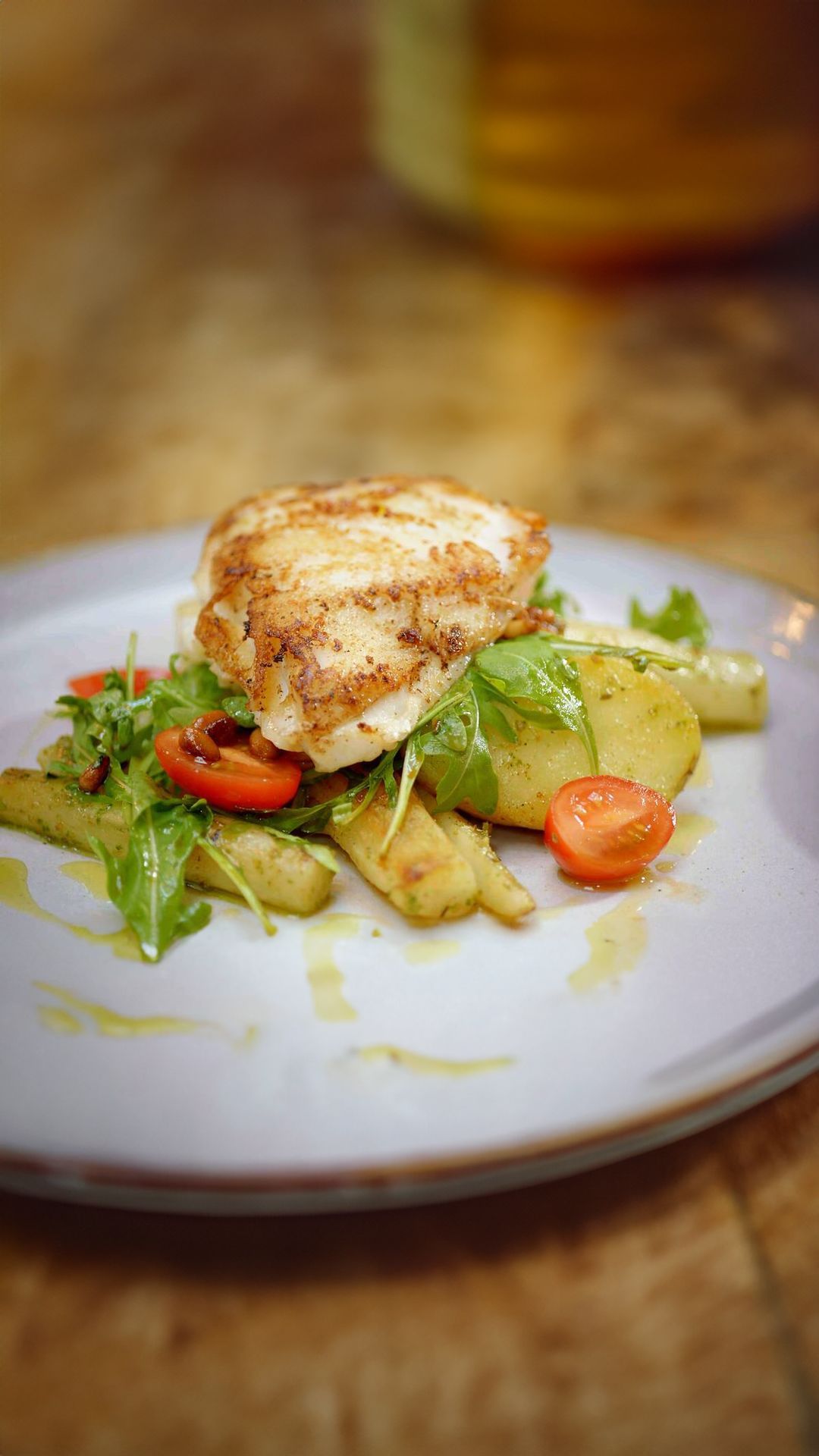 Steenbolk met schorseneren, pesto en gebakken aardappelen