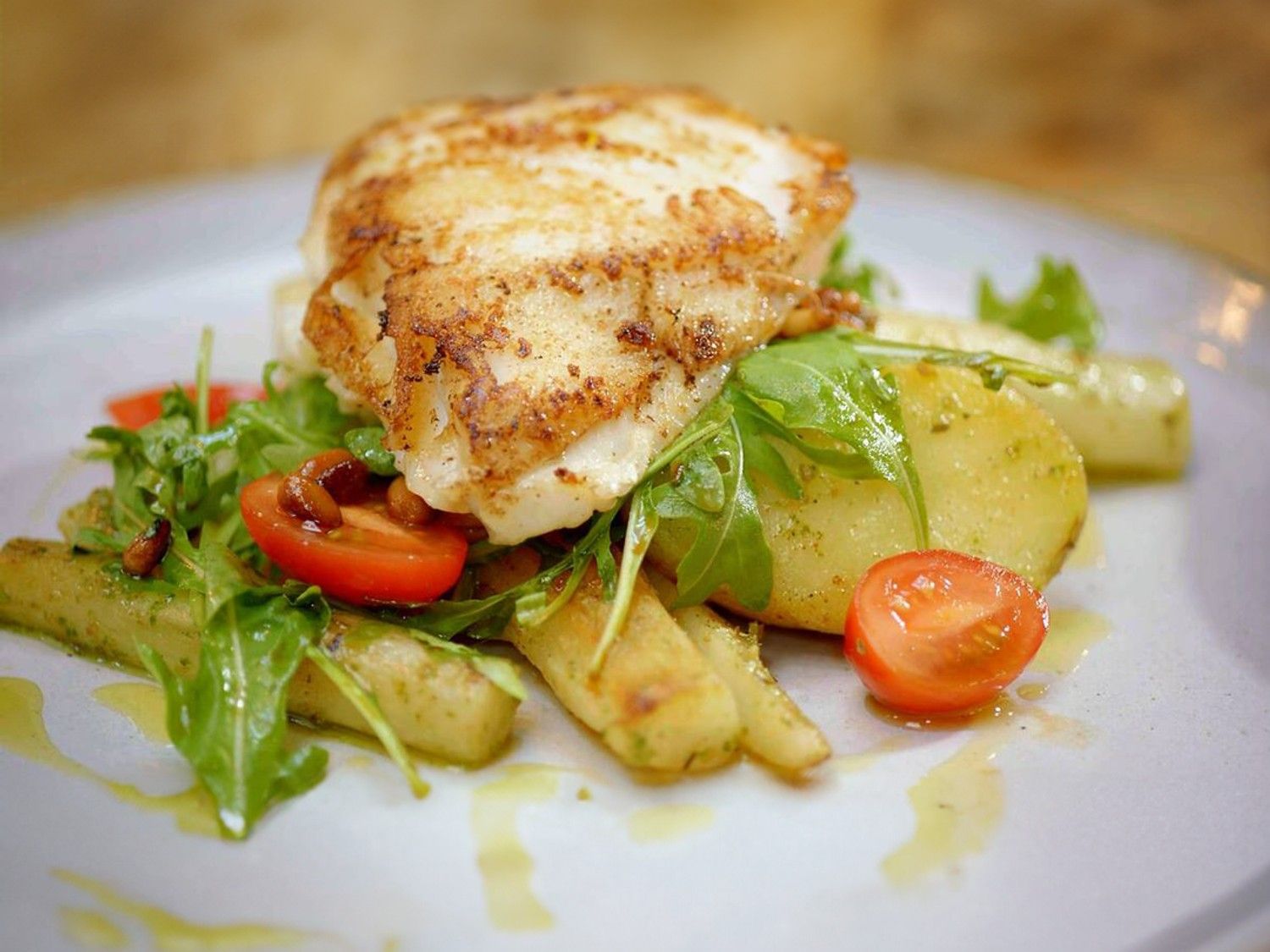 Steenbolk met schorseneren, pesto en gebakken aardappelen